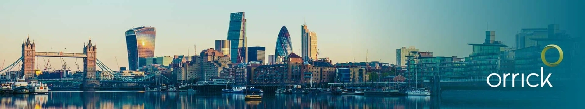 Panoramic view of London skyline featuring Tower Bridge and modern buildings at sunrise with Orrick logo.