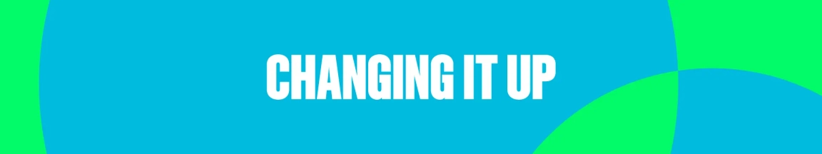Graphic banner with the phrase "CHANGING IT UP" in bold white letters on a blue and green background.