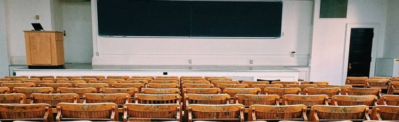 A pciture of a lecture hall, indicating the university setting an education administrator may work in