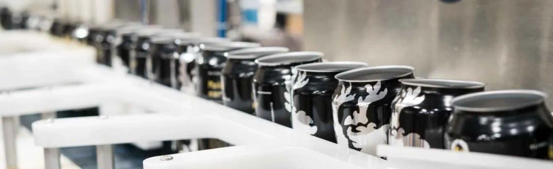 Drinks cans on a production inspection line.
