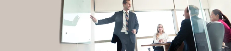 A student in a suit and tie doing a presentation: how to succeed at a property assessment day