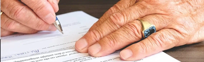 Person signing a contract
