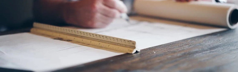 Architect drawing with ruler