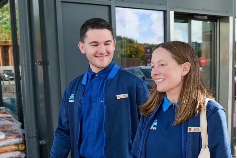 Smiling Aldi employees