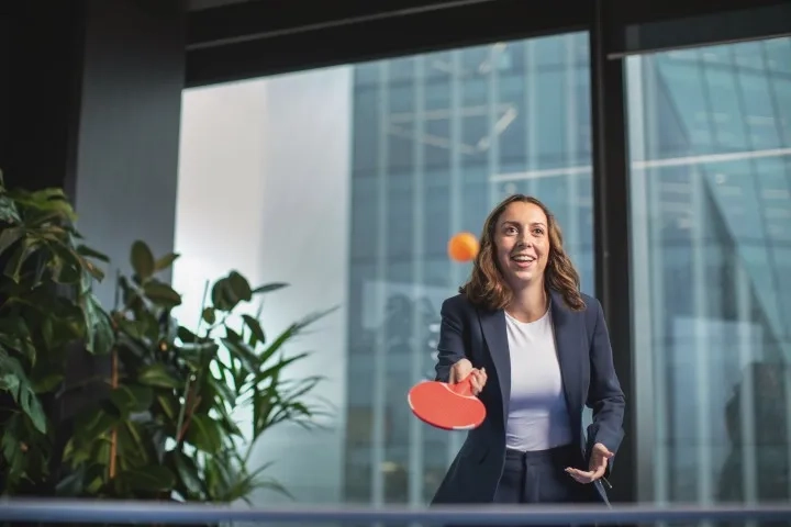 A woman playing table tennis
