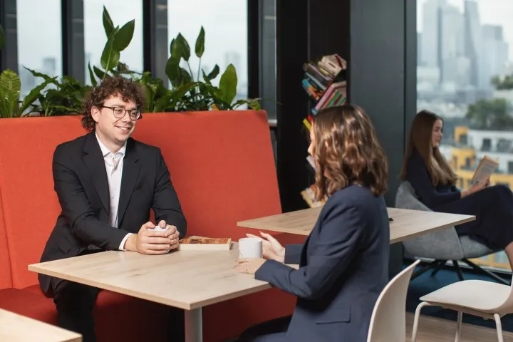 Two employees talking