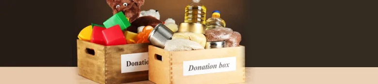 A charity donation boxed filled with food and toys