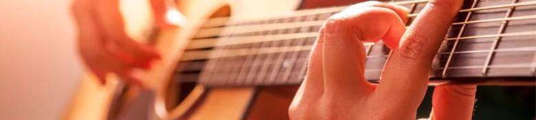 hands playing guitar