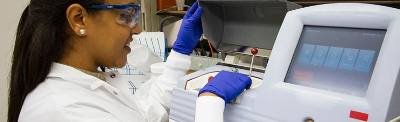 Geneticist working in a lab