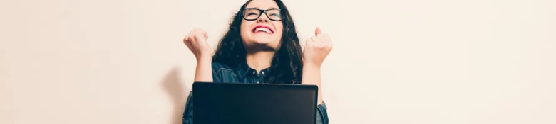 Woman sitting on floor with a look of success