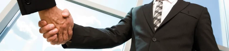 Shaking hands in a suit: how to impress at your property interviews