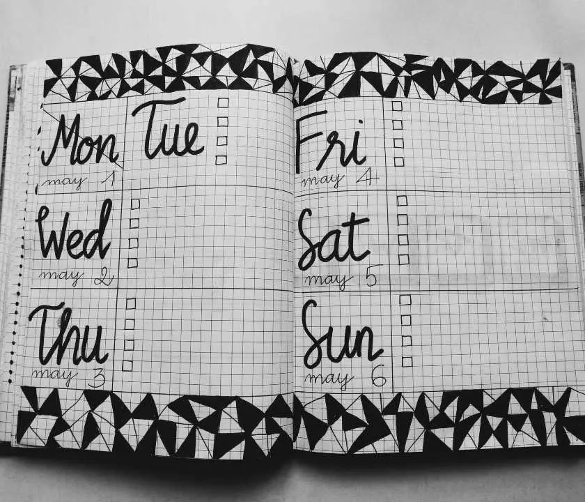 A week's paper diary, annotated with doodles