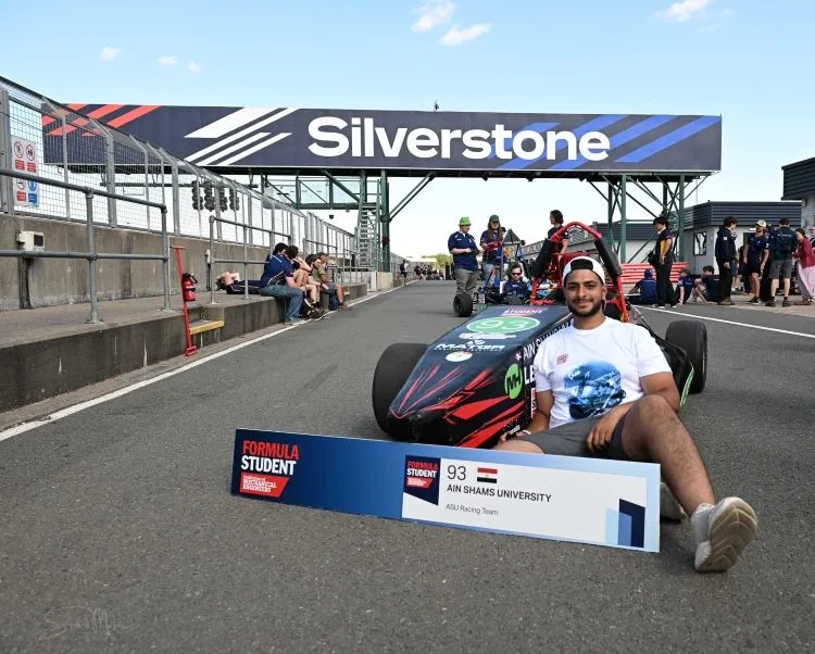A male student on the racetrack