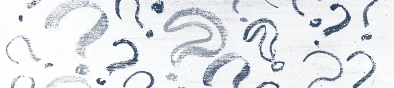 Assorted hand-drawn question marks on a white background, symbolizing inquiry and confusion.