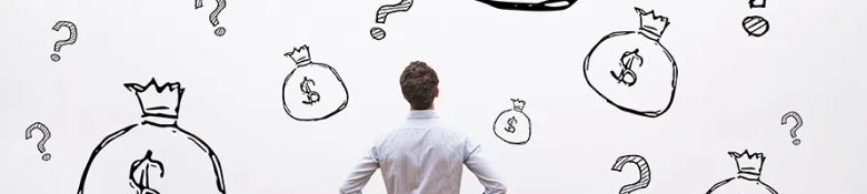 A man looking at a wall, filled with diagrams of money bags