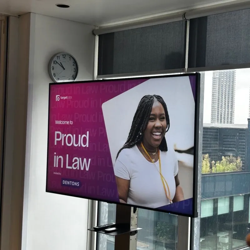 Proud in Law presentation on Monitor screen