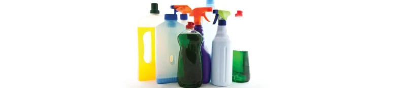 A set of household consumer cleaning products including sprays and liquids.