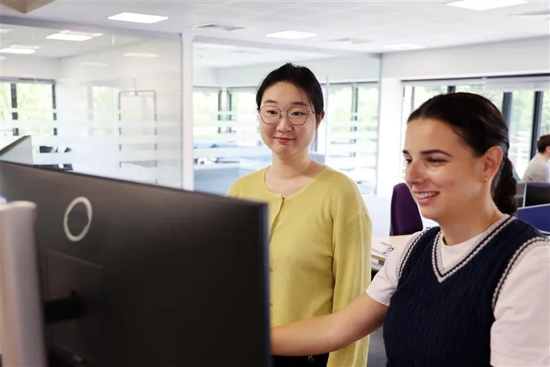 Two female employees working