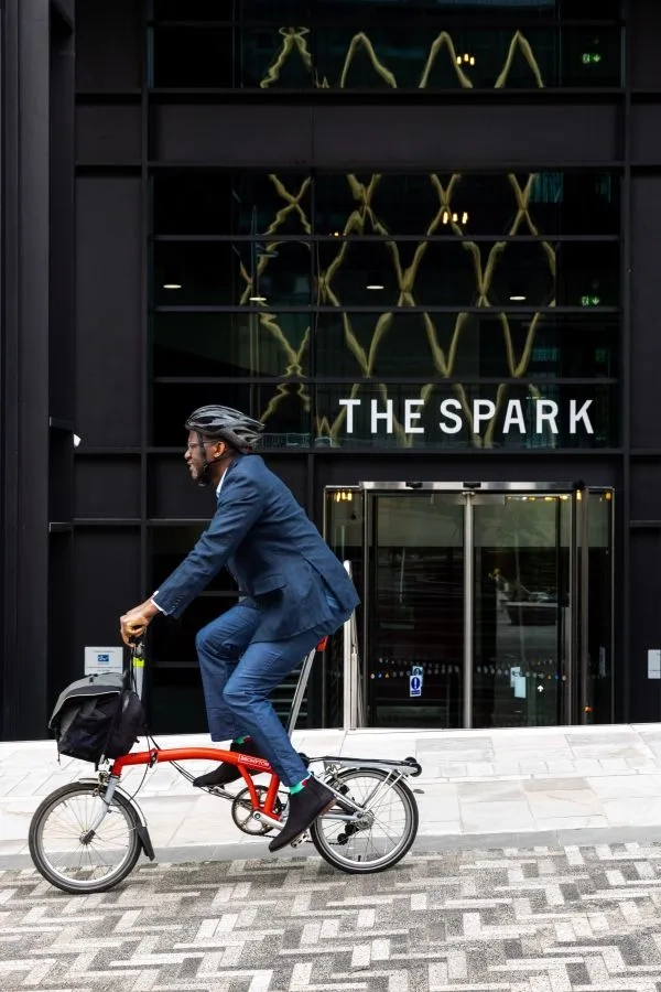 A man riding on on a bicycle