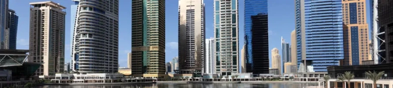 Skyscraper buildings next to a bay in a city in Saudi Arabia. 