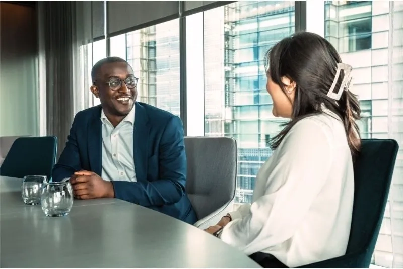 Freshfields trainees man and women speaking 