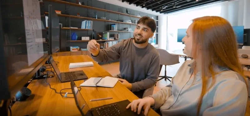 Alex and friend talking