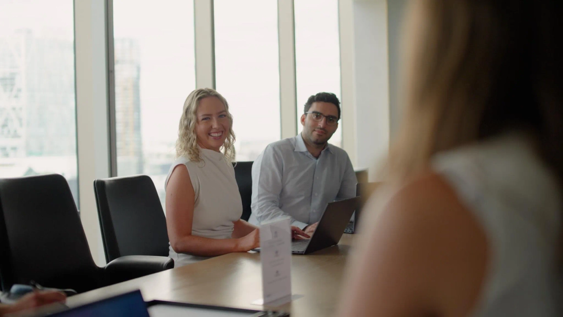 man and woman in meeting together