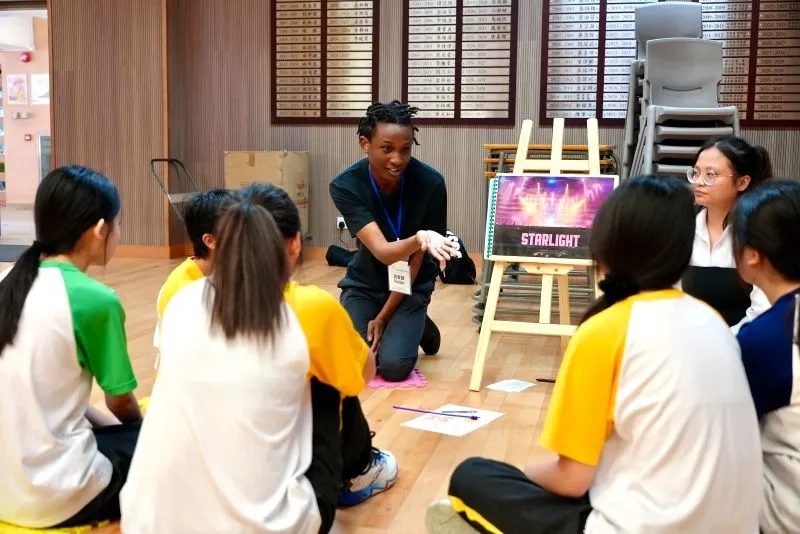 Students listening to their instructors