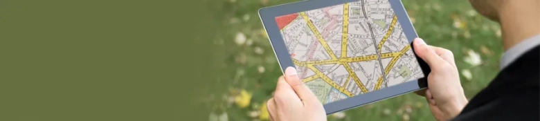 A law interview candidate looking at a map on an iPad.