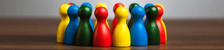 Picture of rainbow coloured pins accompanying the article on diversity at the Bar