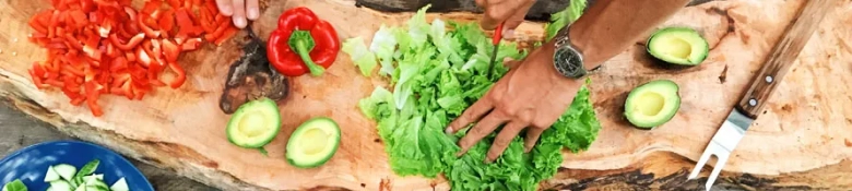 Food being prepared on large chopping board