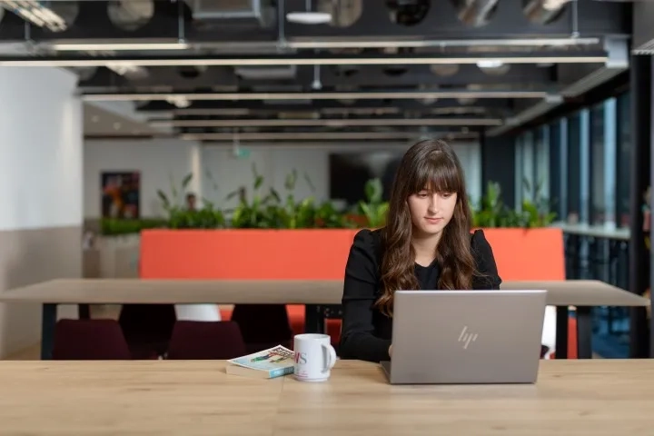 Woman working on her desk