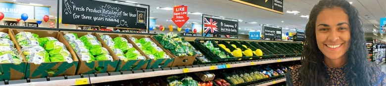 An Aldi graduate retail manager inside an Aldi store.