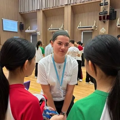 a woman teaching children
