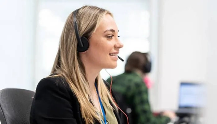 Lady smiling with headset