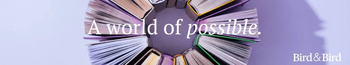 Circular arrangement of colorful books with text "A world of possible" and Bird & Bird logo on a purple background.